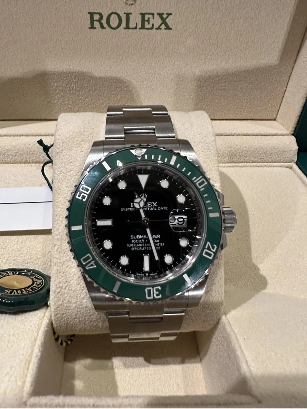 Rolex Submariner Stainless Steel Watch with Green Bezel and Black Dial